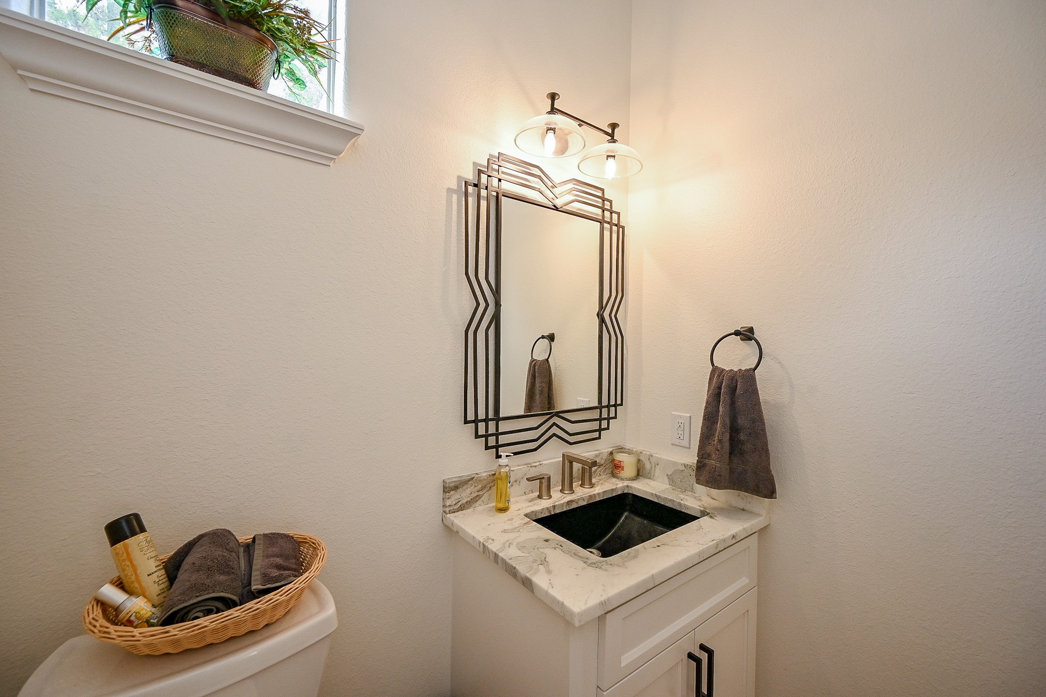 23914 Clouds Rest Magnolia, TX 77355 - Photo 46 of 50 a bathroom with a sink and a mirror