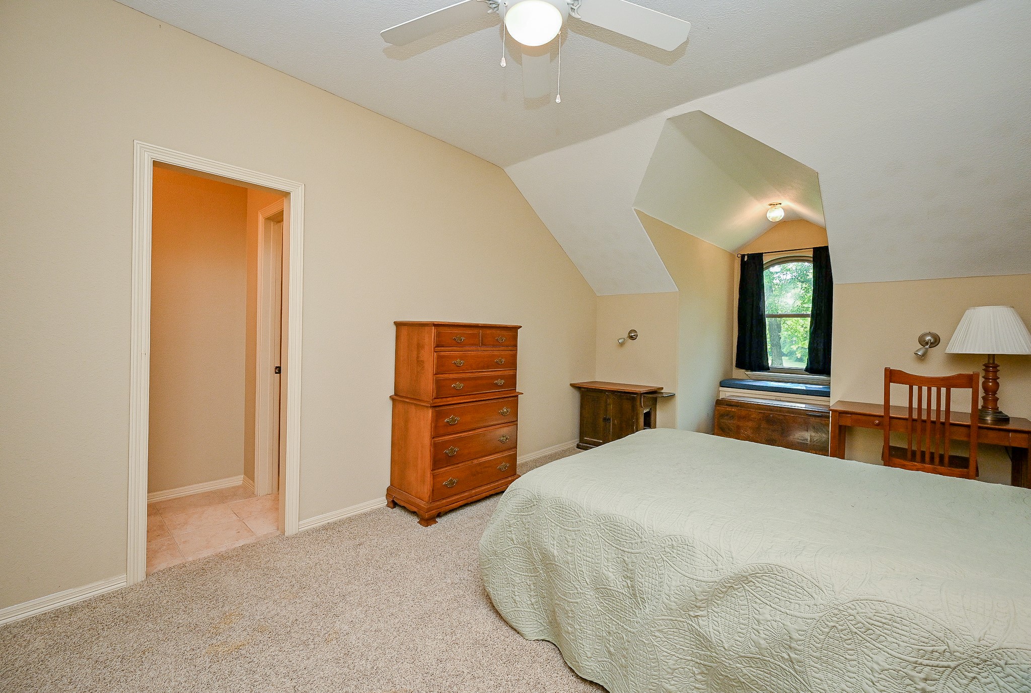 23914 Clouds Rest Magnolia, TX 77355 - Photo 47 of 50 a bedroom with a bed and a chandelier