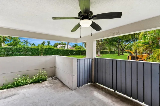 a view of a porch with wooden floor