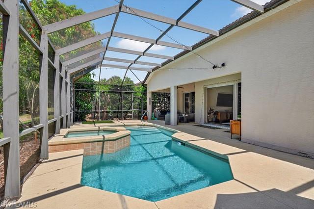 2065 Mandarin Lane Naples, FL 34120 - Photo 32 of 46 a view of swimming pool with patio