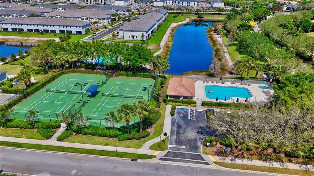 2065 Mandarin Lane Naples, FL 34120 - Photo 46 of 46 an aerial view of a house with a garden and swimming pool