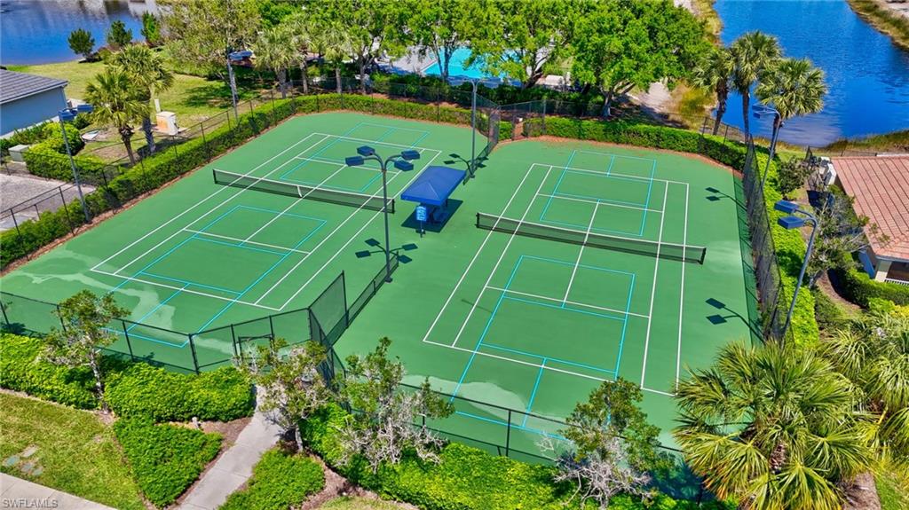 2065 Mandarin Lane Naples, FL 34120 - Photo 10 of 46 a green field with lots of green field