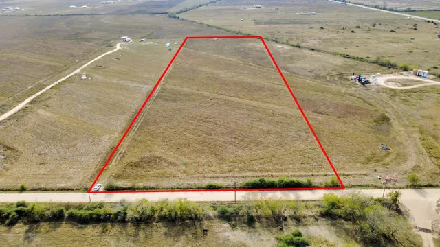 a view of a road with a yard