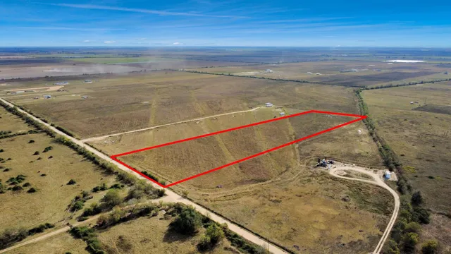 a view of a road with a yard