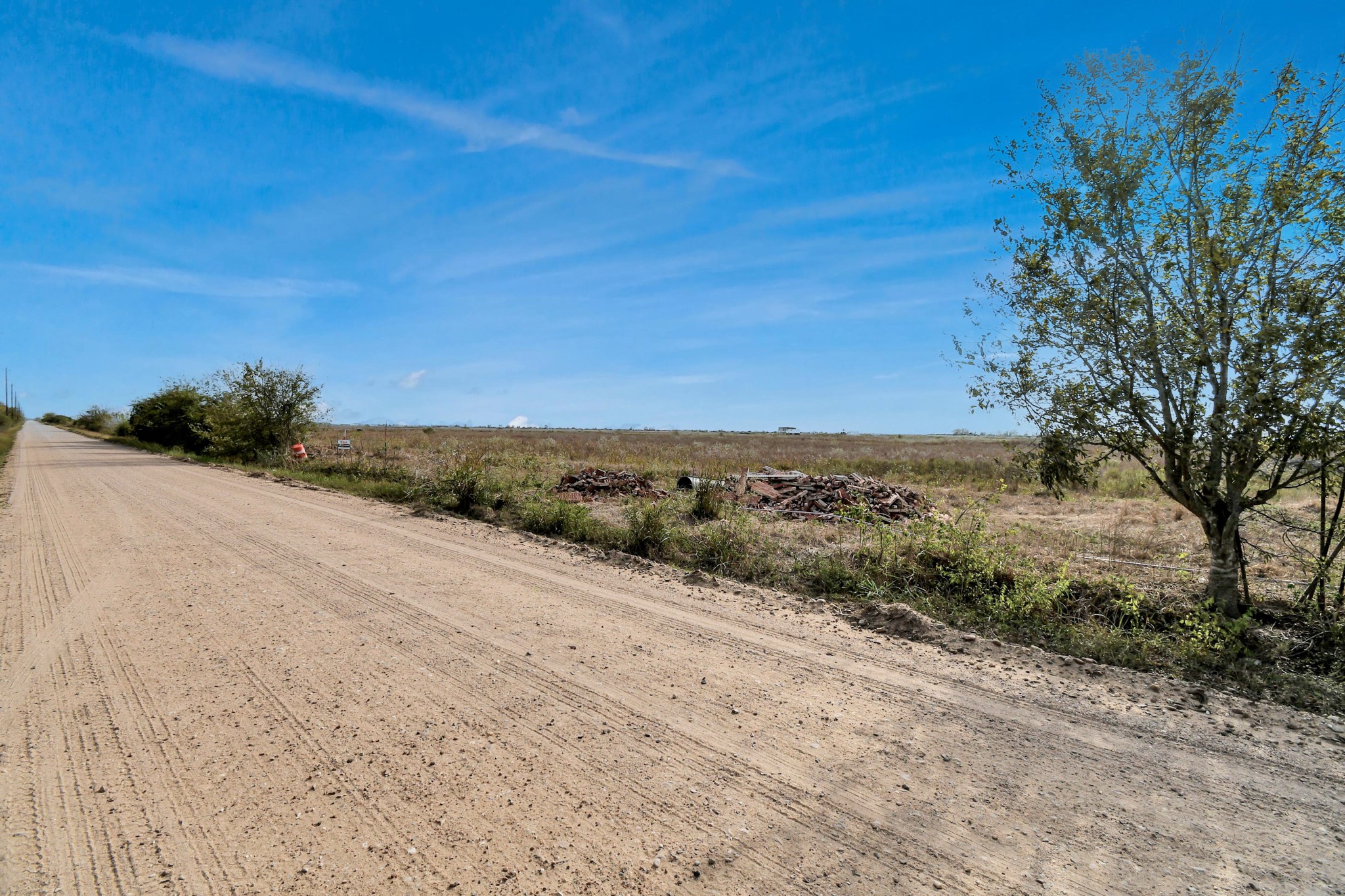 0 Beal Road Eagle Lake, TX 77434 - Photo 25 of 28 a view of a dry yard with wooden fence