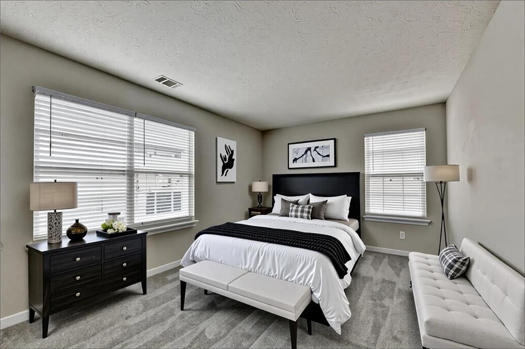 2748 Farmstead Court Grayson, GA 30017 - Photo 14 of 83 a bed room with a bed and a window