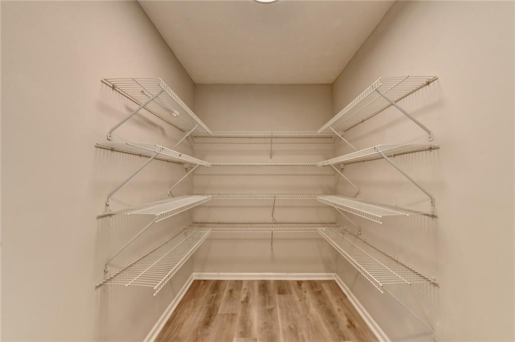 2748 Farmstead Court Grayson, GA 30017 - Photo 44 of 83 a view of a room with racks on the wall