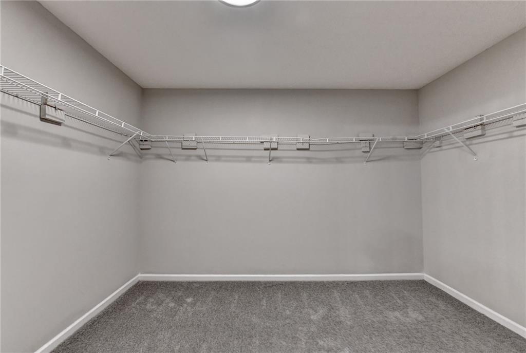 2748 Farmstead Court Grayson, GA 30017 - Photo 53 of 83 a view of a room with racks on the wall