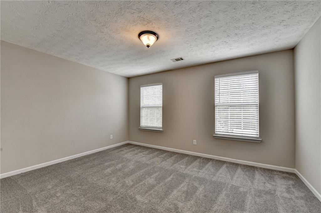 2748 Farmstead Court Grayson, GA 30017 - Photo 54 of 83 an empty room with a window