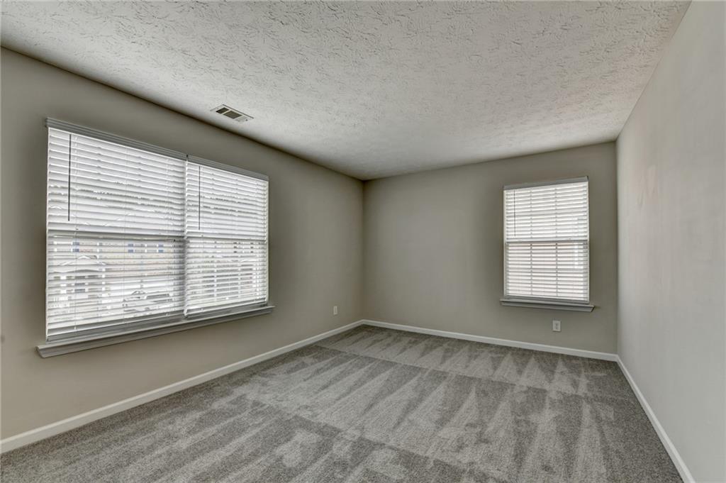 2748 Farmstead Court Grayson, GA 30017 - Photo 56 of 83 a view of an empty room with a window