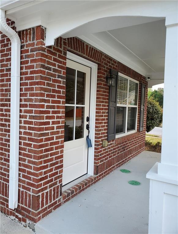 2748 Farmstead Court Grayson, GA 30017 - Photo 7 of 83 a front view of a house with a yard