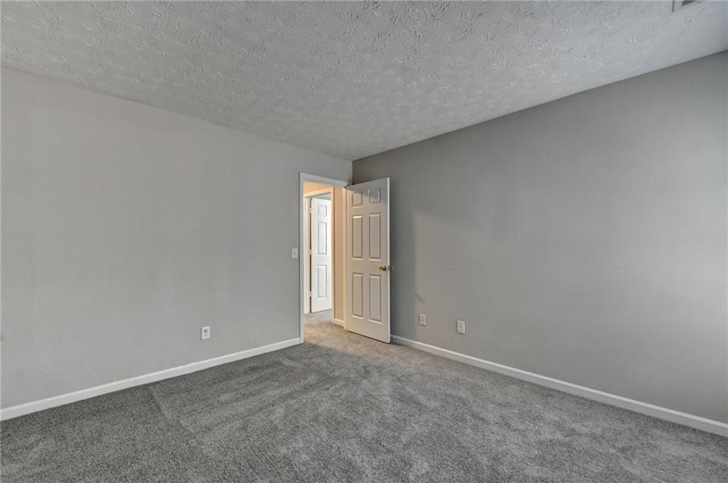 2748 Farmstead Court Grayson, GA 30017 - Photo 76 of 83 a view of an empty room with a window