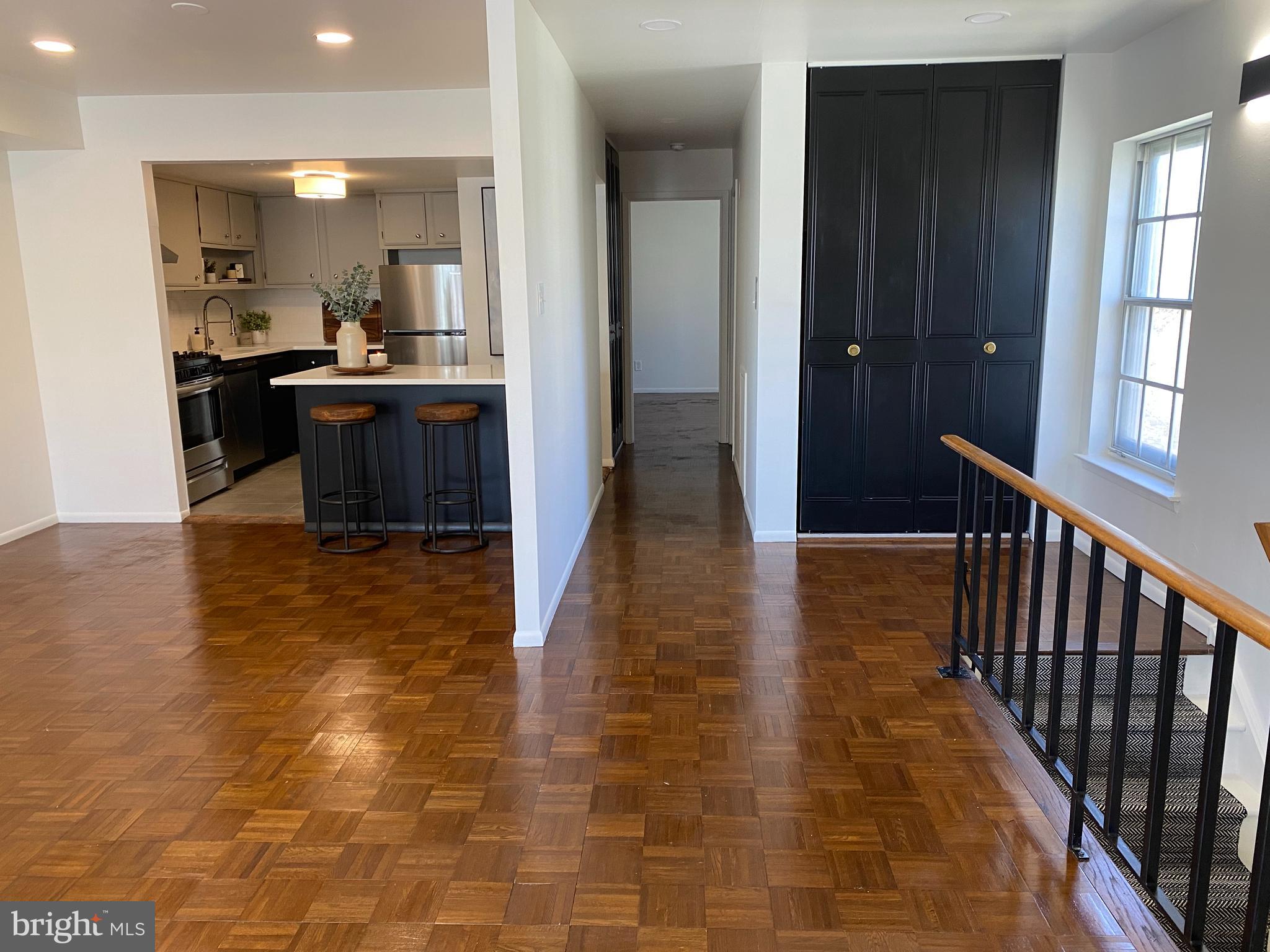 371 Old Forge Crossing, Unit 371 Devon, PA 19333 - Photo 3 of 10 a view of a kitchen from the hallway
