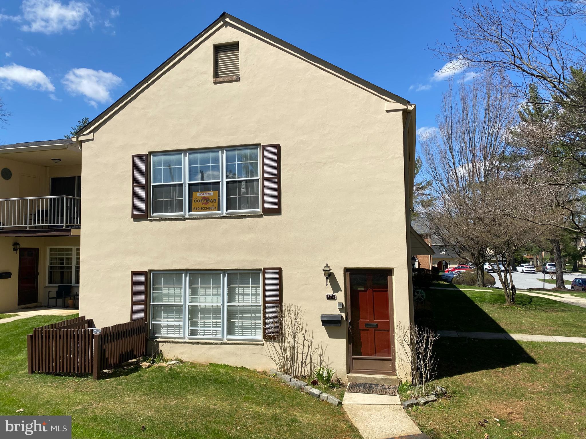 371 Old Forge Crossing, Unit 371 Devon, PA 19333 - Photo 6 of 10 a front view of a house with a yard