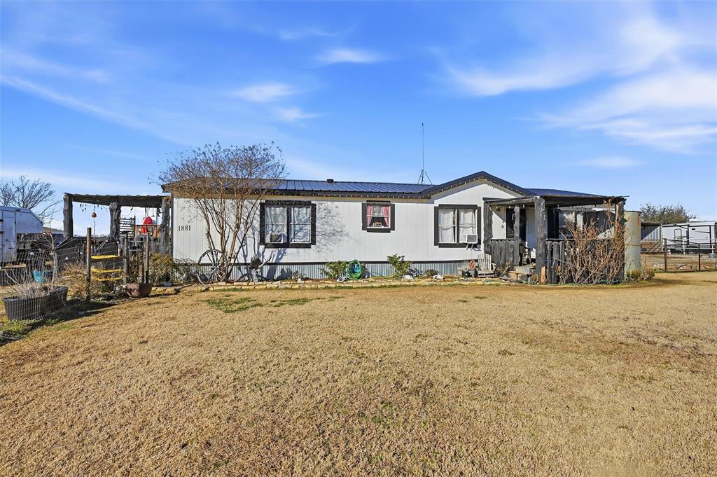 1881 Maier Road Pilot Point, TX 76258 - Photo 1 of 1 a house view with a outdoor space