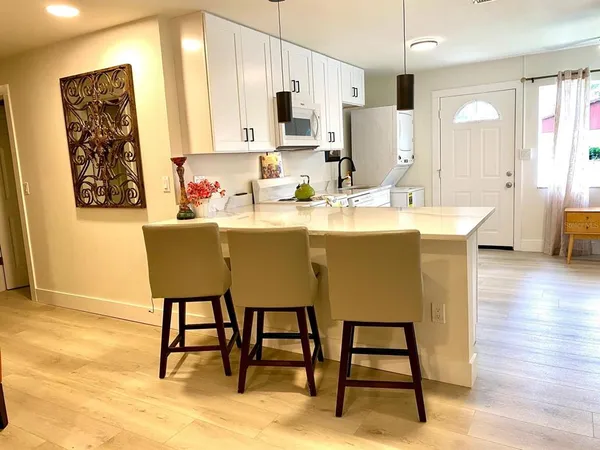 a view of a dining room with furniture