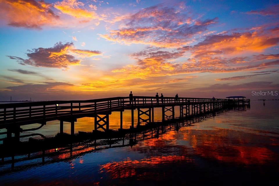 415 Mapleway, Unit A Safety Harbor, FL 34695 - Photo 48 of 50 a view of a lake from a balcony