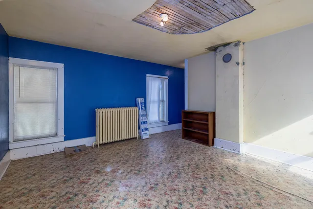a spacious bathroom with a bathtub and a shower