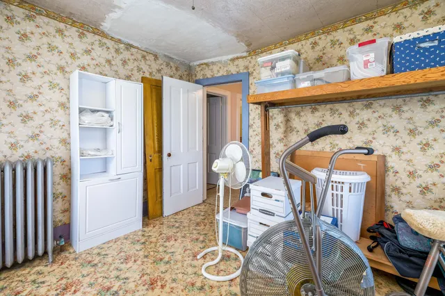 a hallway with washer and dryer