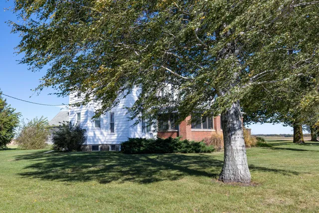 a view of a back yard of the house