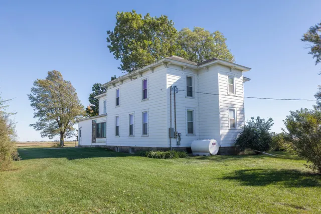 a garden view with a sitting space