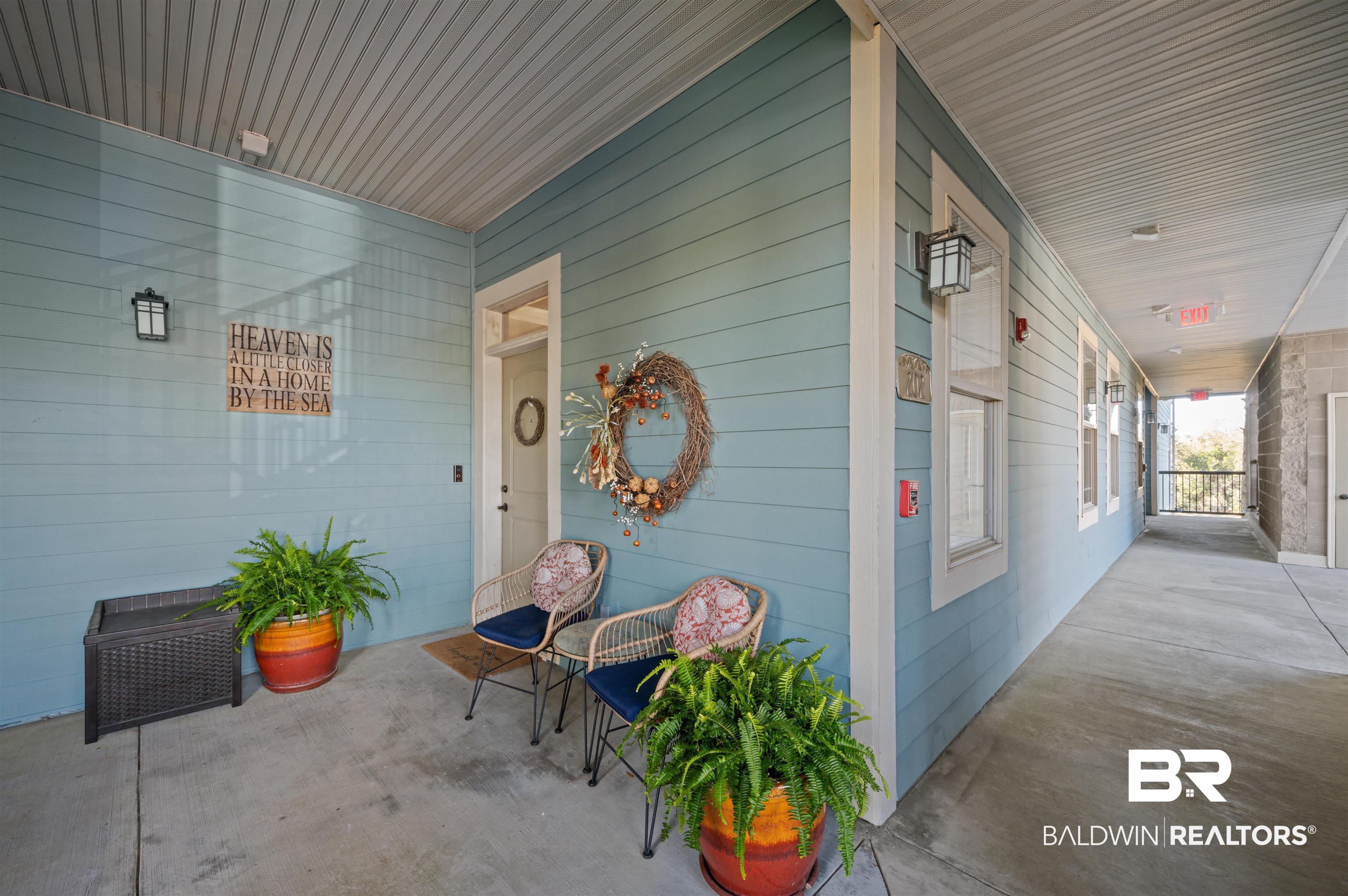 1430 Regency Road, Unit B202 Gulf Shores, AL 36542 - Photo 2 of 33 Entrance to property with a porch