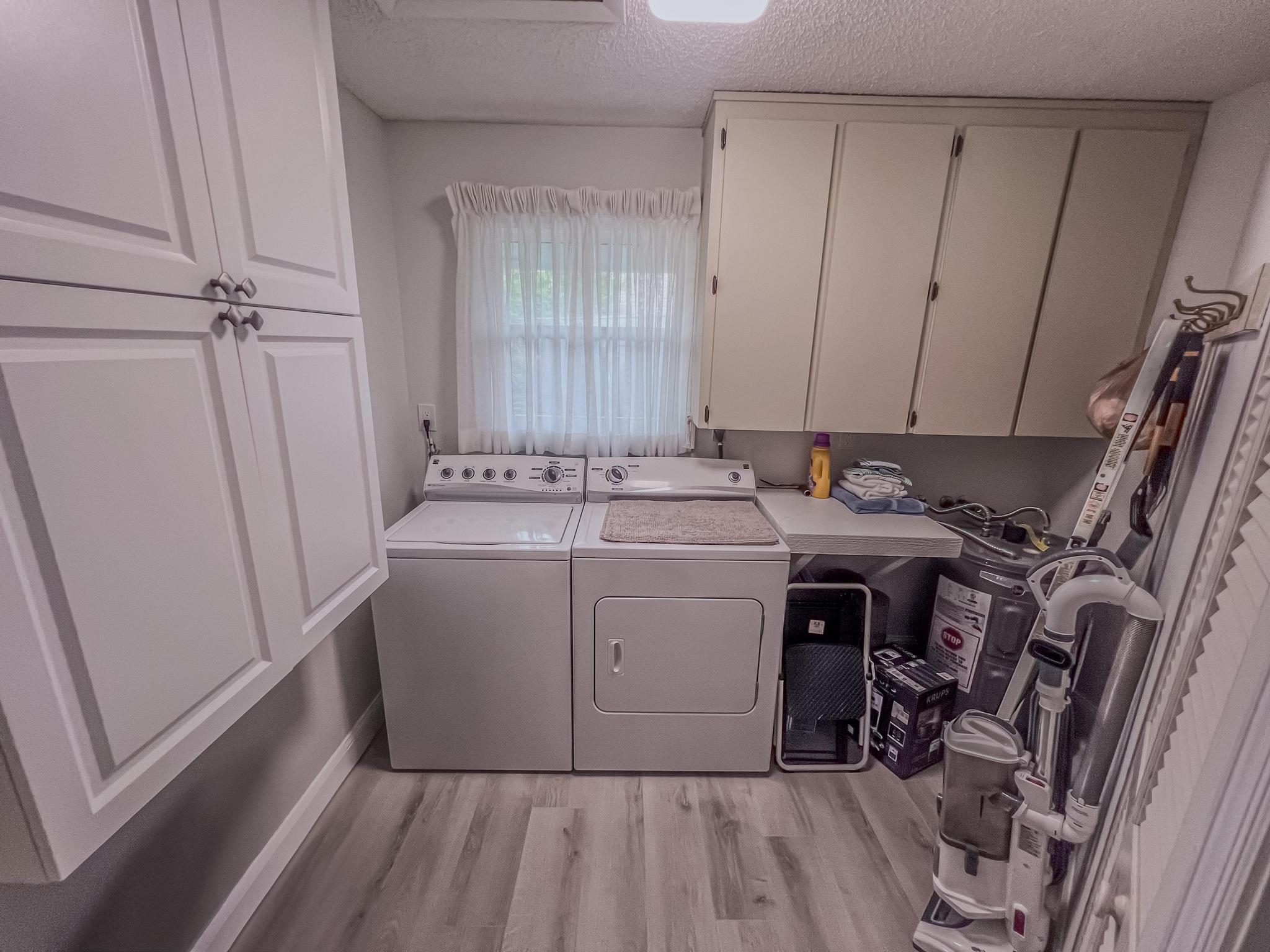 1127 East Seminole Avenue, Unit 11B Jupiter, FL 33477 - Photo 21 of 33 laundry room