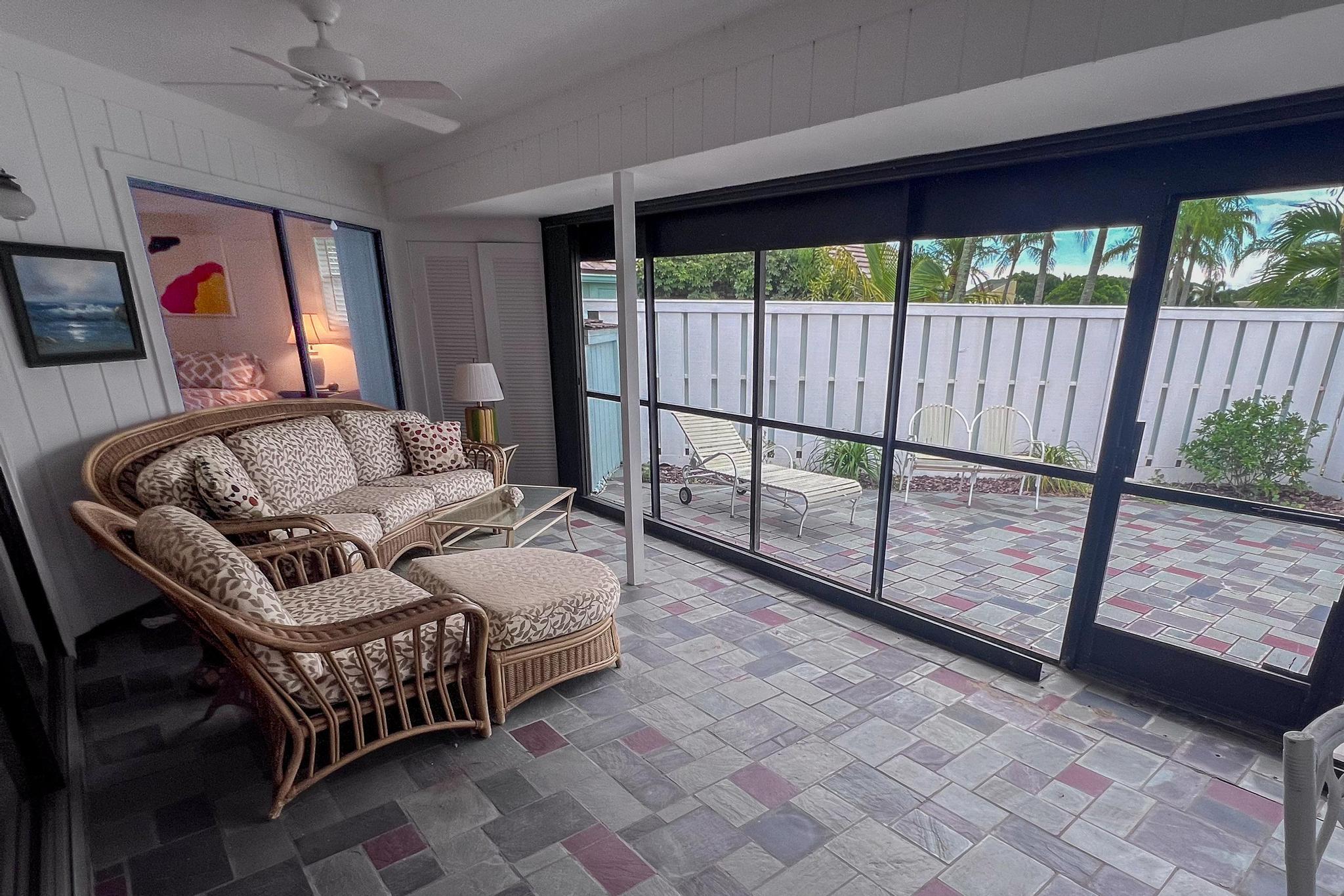 1127 East Seminole Avenue, Unit 11B Jupiter, FL 33477 - Photo 23 of 33 Porch seating area