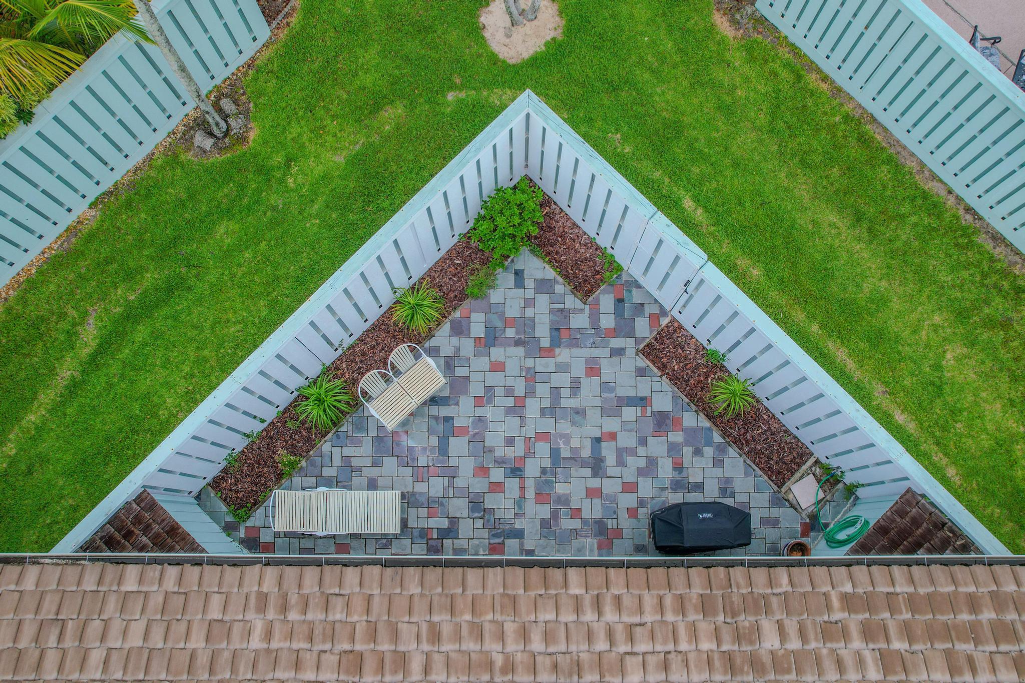 1127 East Seminole Avenue, Unit 11B Jupiter, FL 33477 - Photo 27 of 33 aerial view of patio