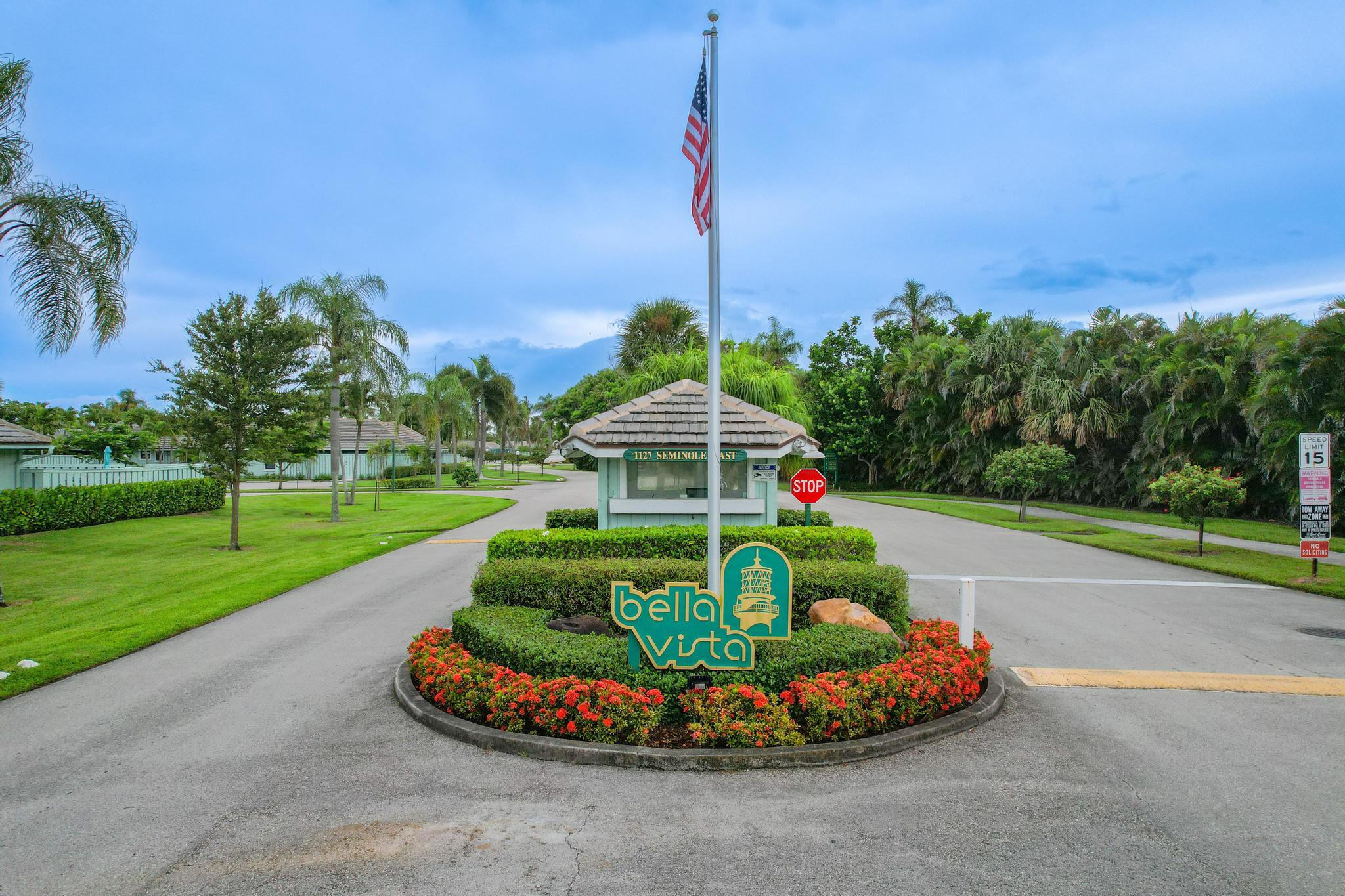1127 East Seminole Avenue, Unit 11B Jupiter, FL 33477 - Photo 28 of 33 Bella Vista Entrance