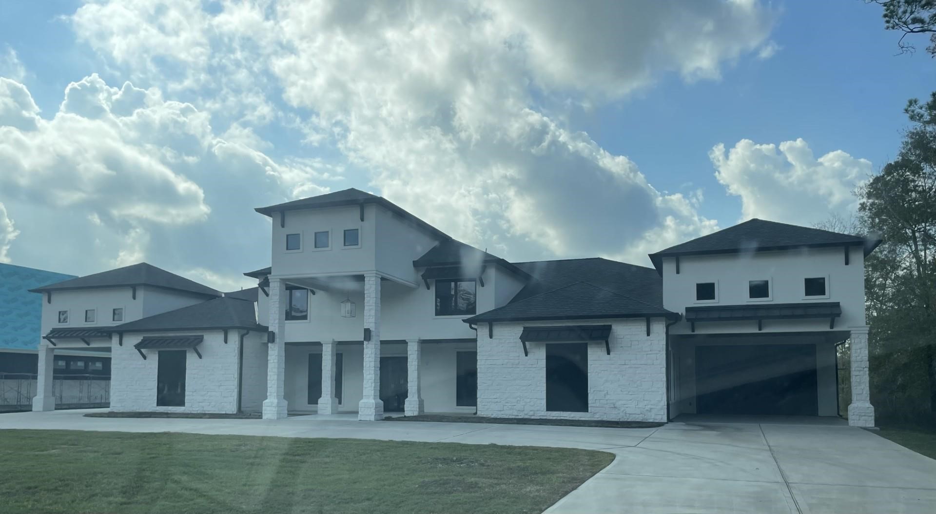 27583 South Lazy Meadow Way Spring, TX 77386 - Photo 5 of 6 a front view of a house with a yard