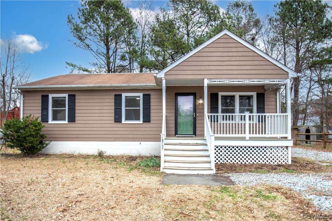 15909 Sandwave Road Chester, VA 23831 - Photo 3 of 20 a front view of a house
