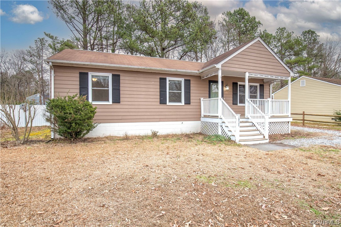 15909 Sandwave Road Chester, VA 23831 - Photo 4 of 20 front view of a house with a yard