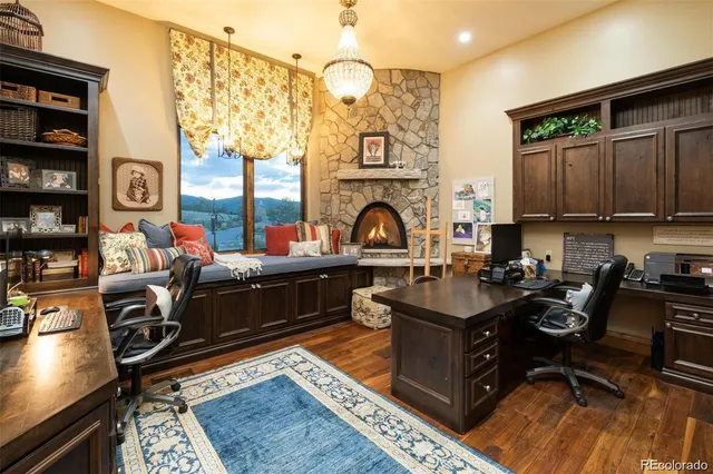 a room with furniture a rug and a window