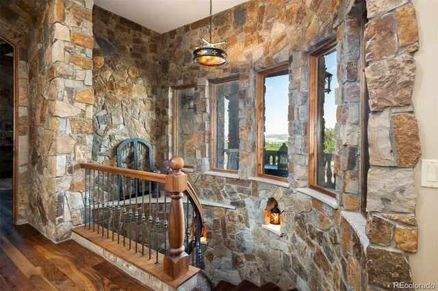 a view of balcony with furniture