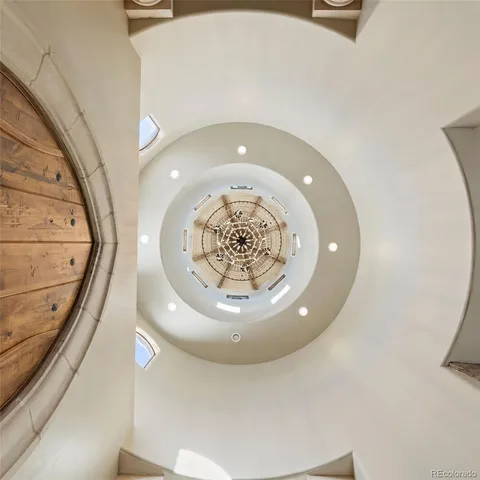 an entryway view with wooden floor