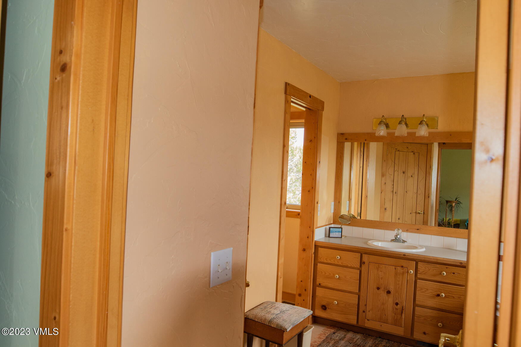 460 Mesa Drive Eagle, CO 81631 - Photo 15 of 42 a bathroom with a sink and a mirror