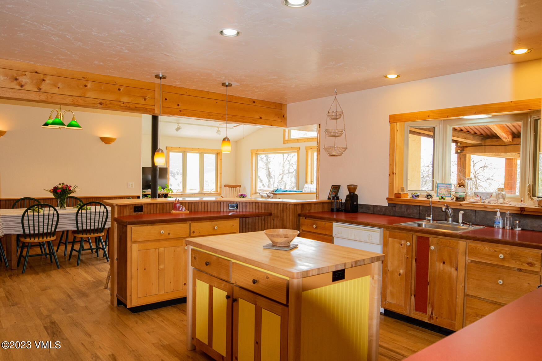 460 Mesa Drive Eagle, CO 81631 - Photo 9 of 42 a kitchen with a sink and wooden cabinets