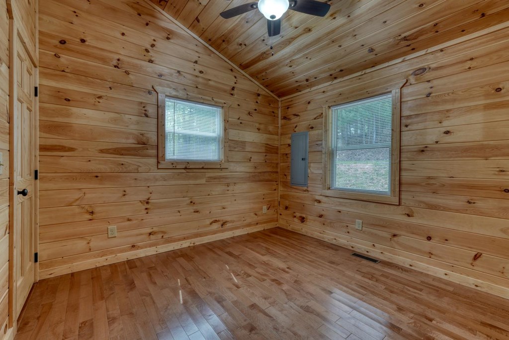100 Fern Cv Lane Murphy, NC 28906 - Photo 26 of 28 a view of a room with wooden floor and brick walls