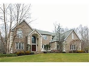 12 Coe Farm Road Montebello, NY 10901 - Photo 1 of 1 front view of a house with a yard
