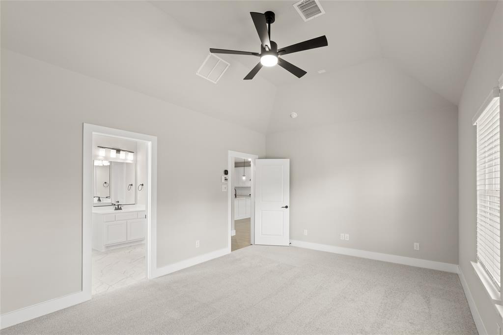 1850 Silver Birch Road Waxahachie, TX 75165 - Photo 22 of 36 an empty room with closet and a window