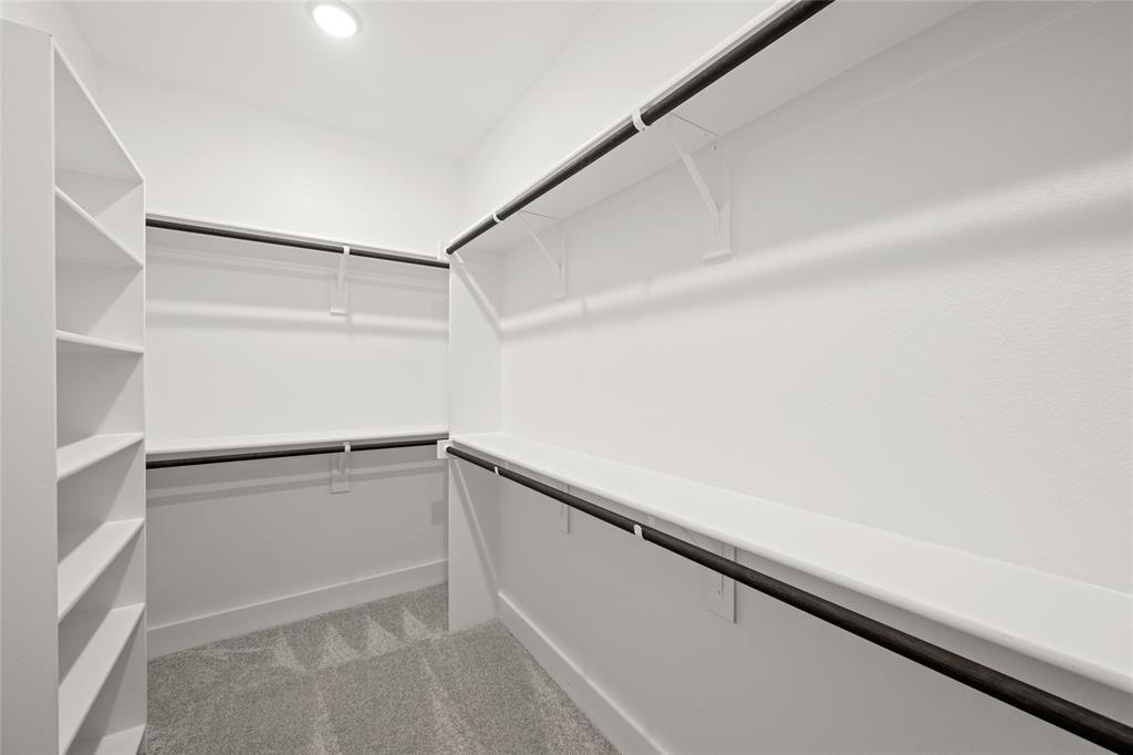 1850 Silver Birch Road Waxahachie, TX 75165 - Photo 26 of 36 a view of an empty walk in closet