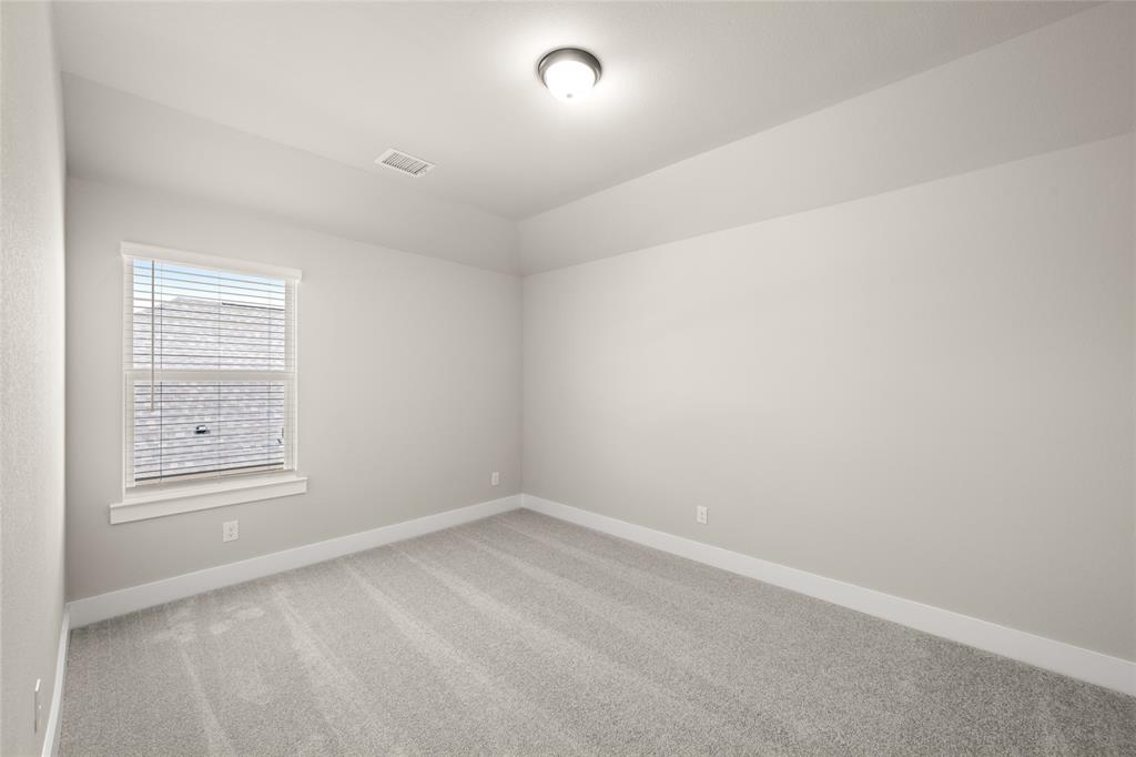 1850 Silver Birch Road Waxahachie, TX 75165 - Photo 28 of 36 an empty room with windows