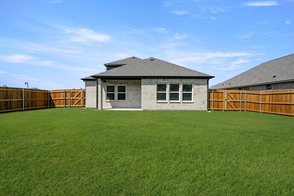 1850 Silver Birch Road Waxahachie, TX 75165 - Photo 36 of 36 a front view of a house with a garden
