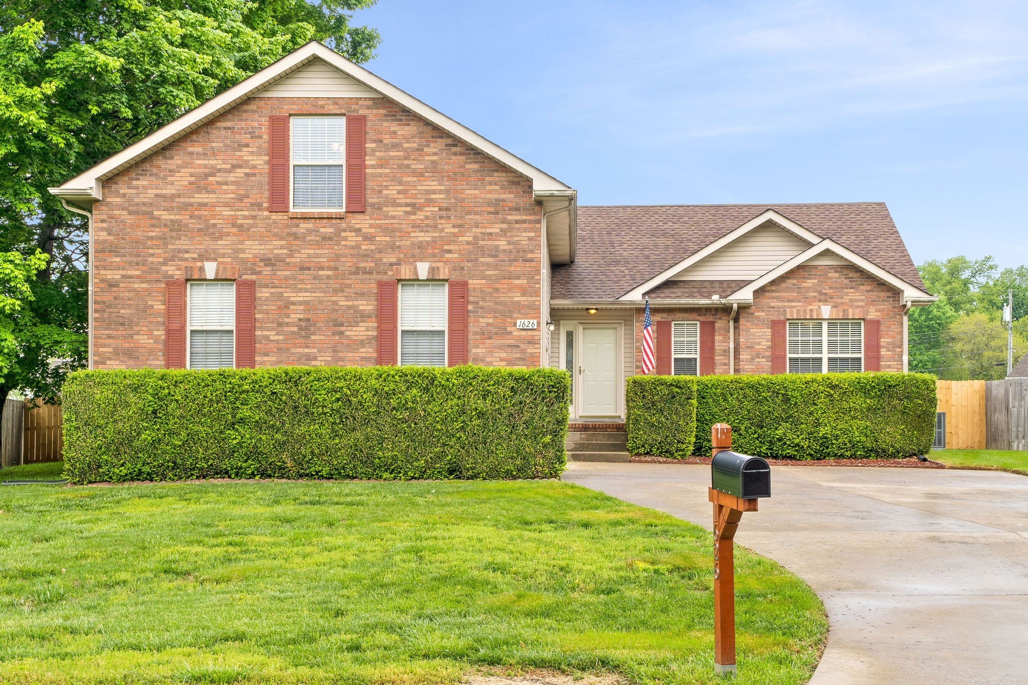 1626 Windriver Road Clarksville, TN 37042 - Photo 1 of 31 a front view of a house with a yard