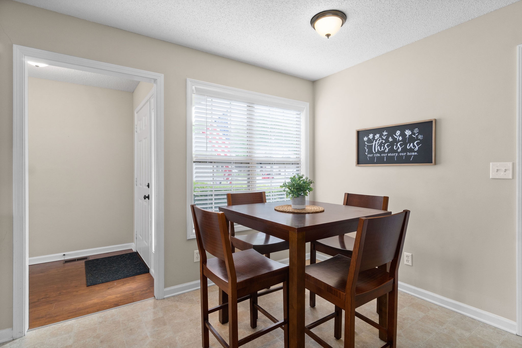 1626 Windriver Road Clarksville, TN 37042 - Photo 14 of 31 a view of a dining room with furniture and window