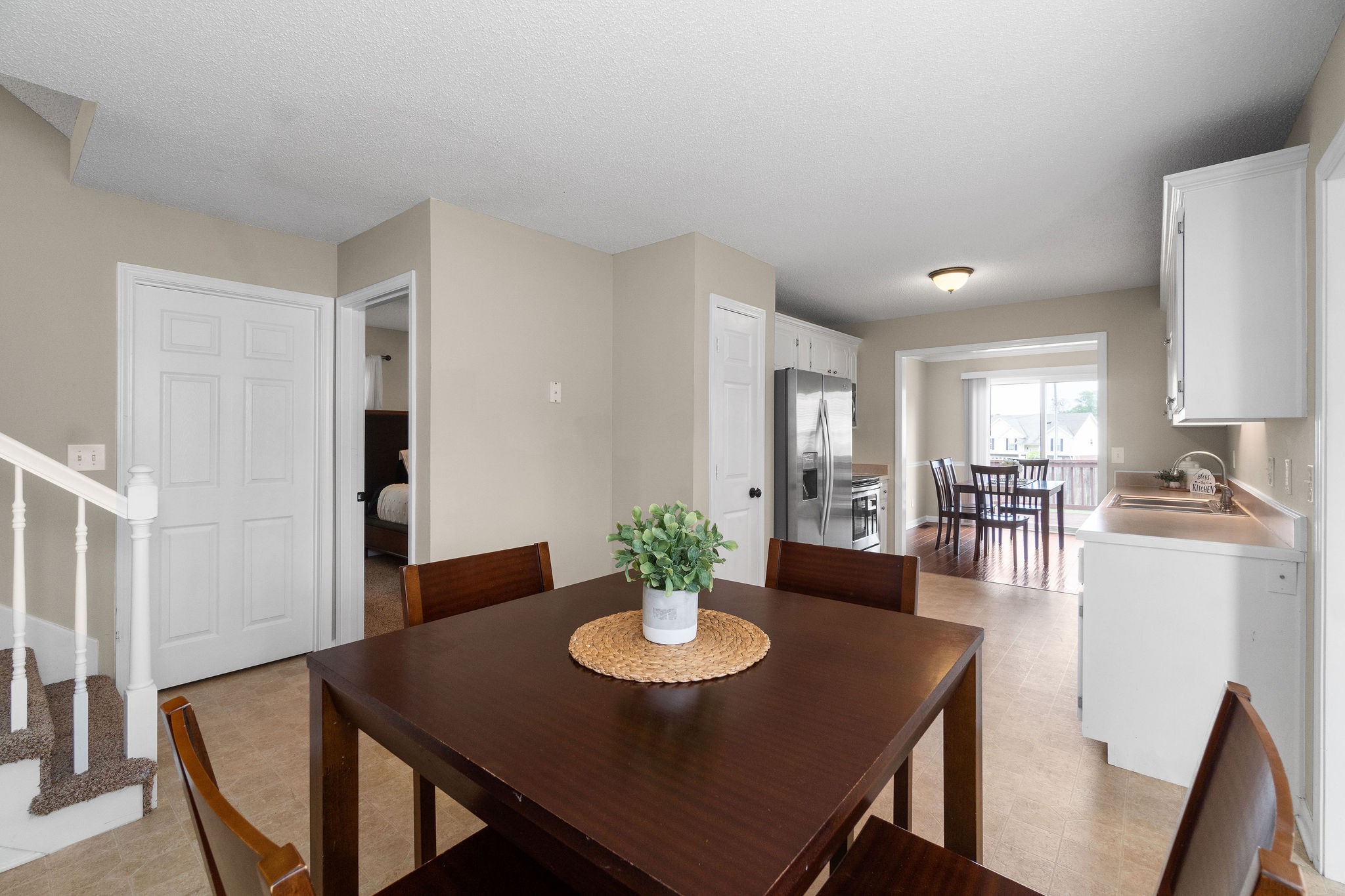 1626 Windriver Road Clarksville, TN 37042 - Photo 16 of 31 a view of a dining room with furniture and chandelier