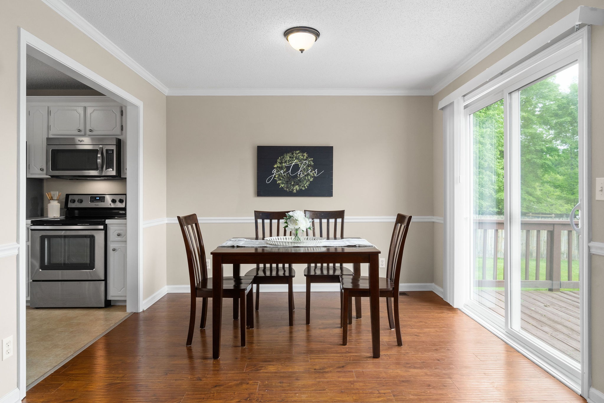 1626 Windriver Road Clarksville, TN 37042 - Photo 9 of 31 a view of a dining room with furniture window and wooden floor