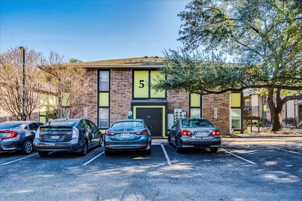a car parked in front of a house