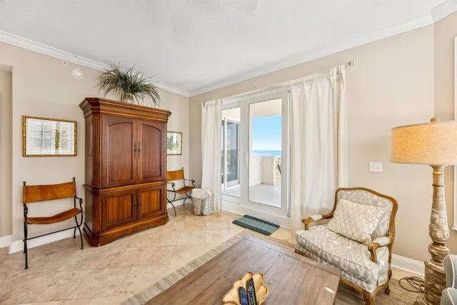 a bedroom with furniture and wooden floor